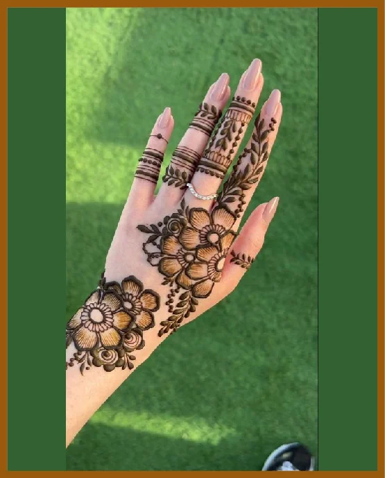 Leafy Lines Forming A Modern Back Hand Mehndi Design